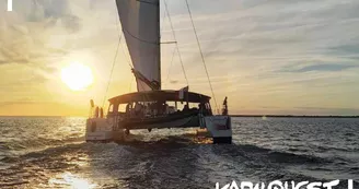 Sortie à l'heure du coucher de soleil en catamaran à voile - Kapalouest